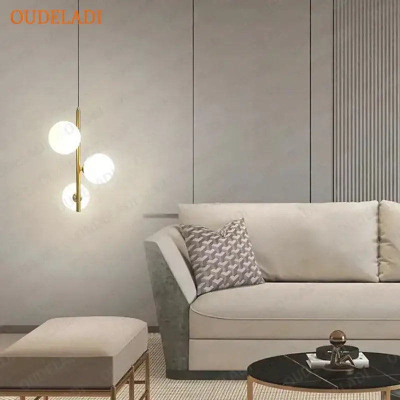 Modern brass and black glass ball pendant light dining room