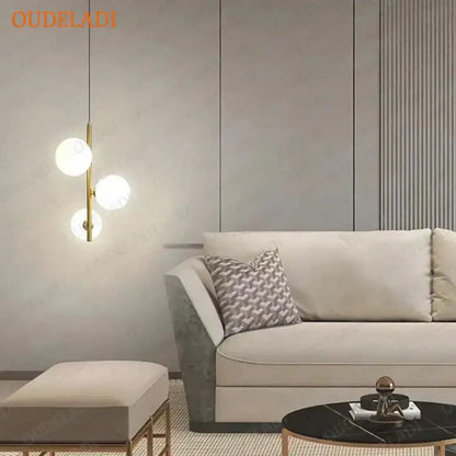 Modern brass and black glass ball pendant light dining room