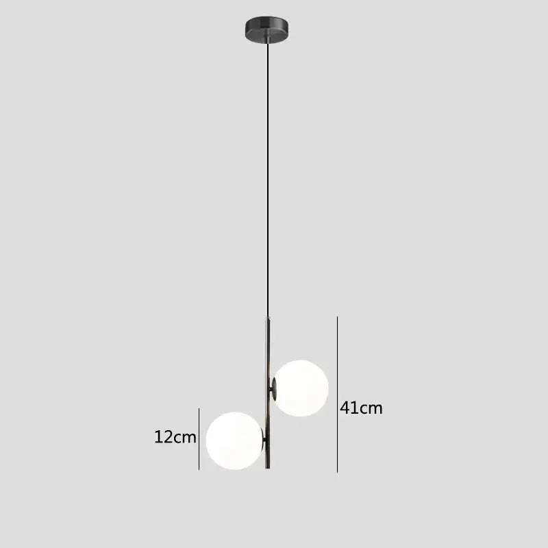 Modern brass and black glass ball pendant light dining room