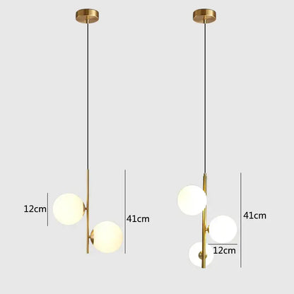 Modern brass and black glass ball pendant light dining room