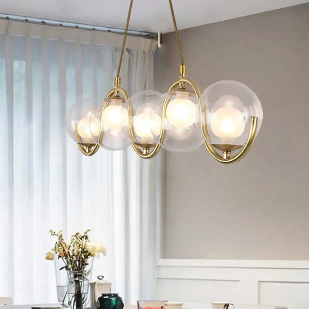 Modern brass and clear glass globe pendant light kitchen fixture