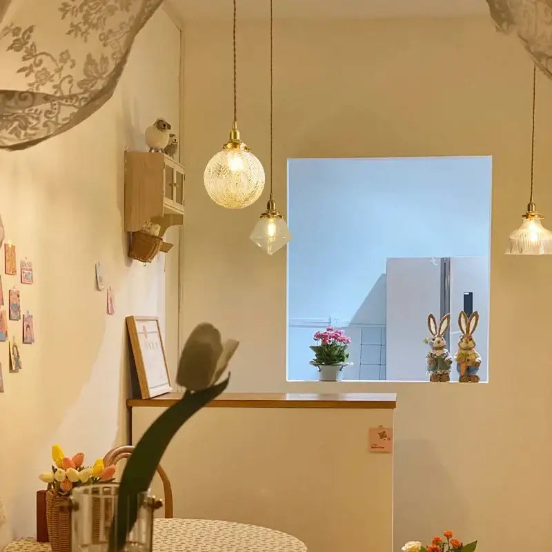 Modern brass and clear glass led pendant light for dining room