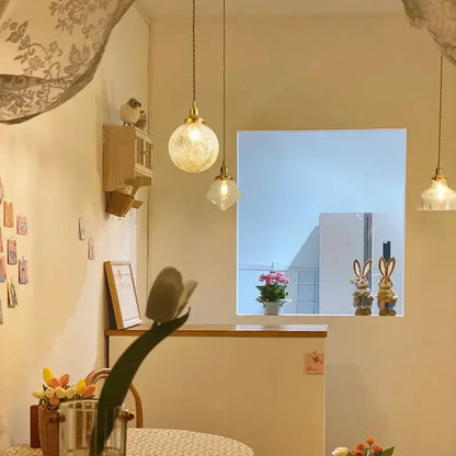 Modern brass and clear glass led pendant light for dining room