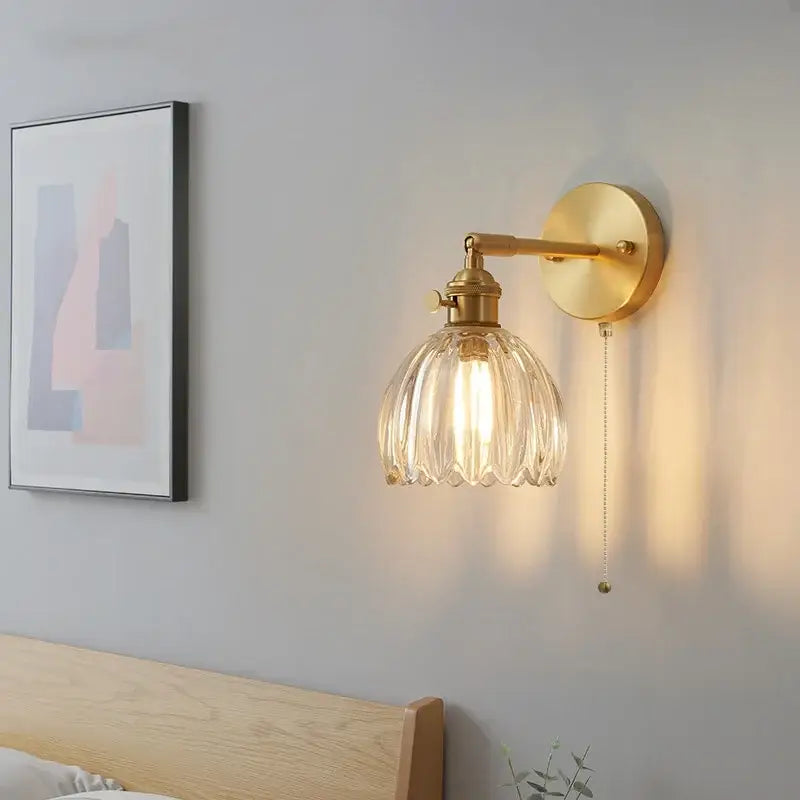 Modern brass and clear glass wall lights – bedroom rotating sconce