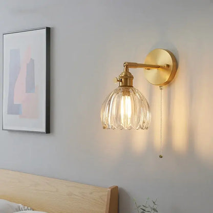 Modern brass and clear glass wall lights – bedroom rotating sconce