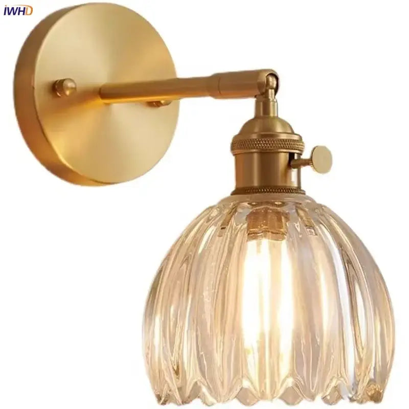 Modern brass and clear glass wall lights – bedroom rotating sconce