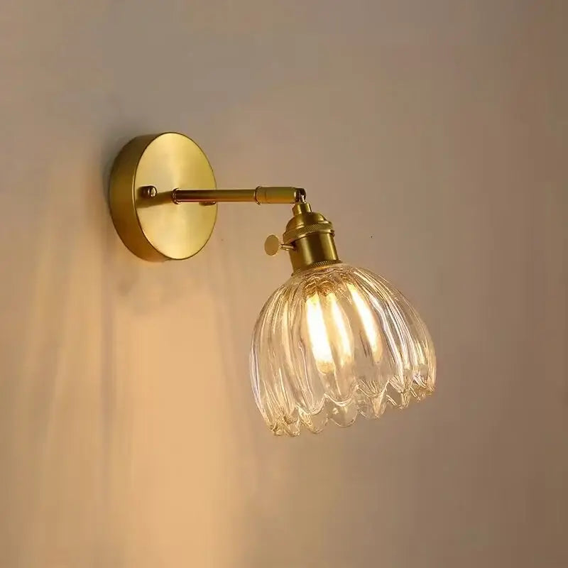 Modern brass and clear glass wall lights – bedroom rotating sconce