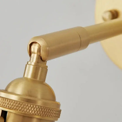 Modern brass and clear glass wall lights – bedroom rotating sconce