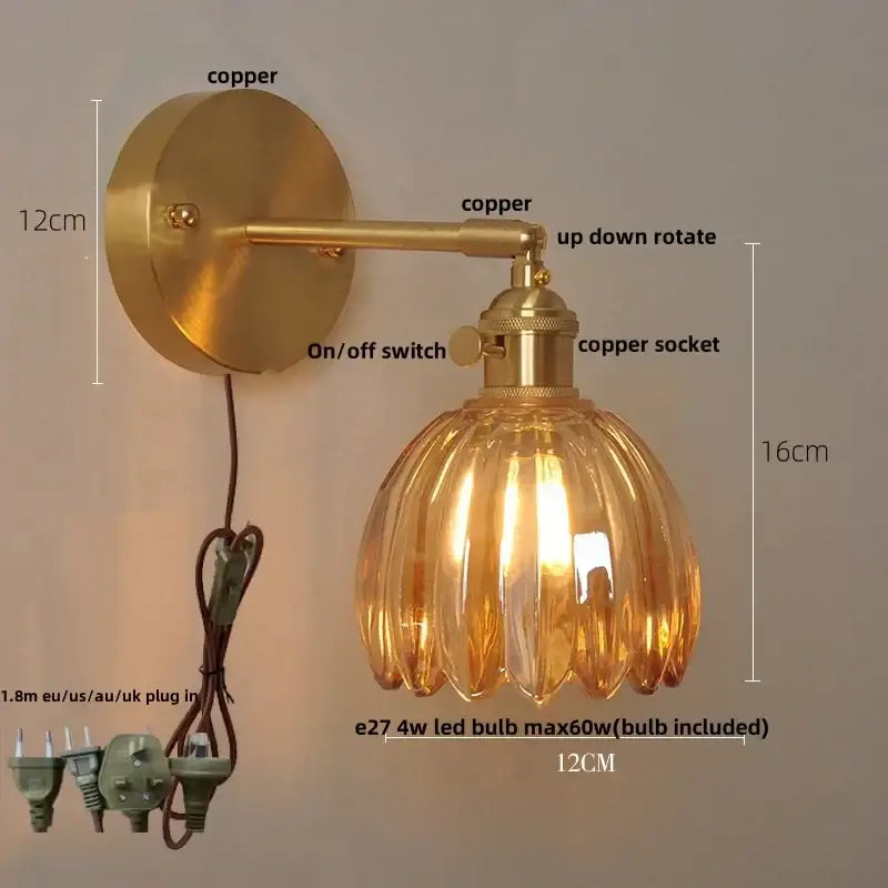 Modern brass and clear glass wall lights – bedroom rotating sconce