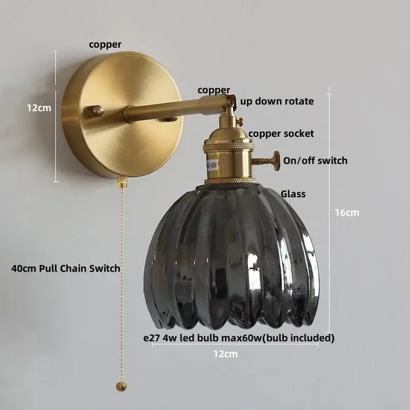Modern brass and clear glass wall lights – bedroom rotating sconce