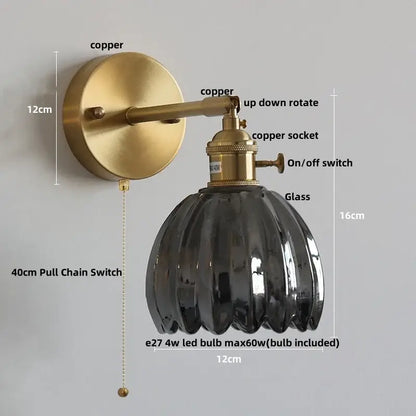 Modern brass and clear glass wall lights – bedroom rotating sconce