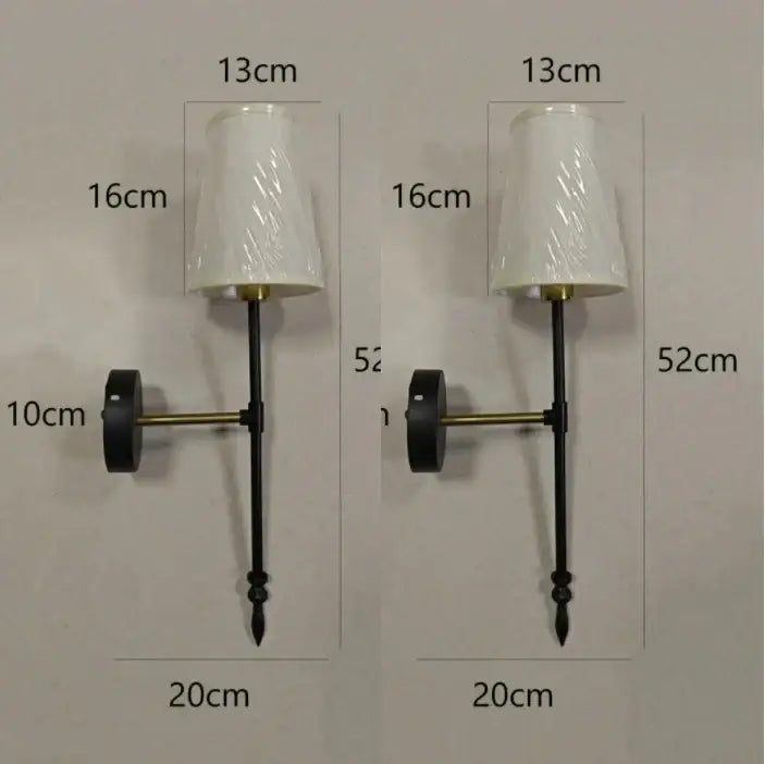 Modern brass and cream fabric led wall lamps for bedroom