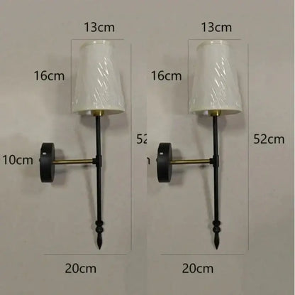 Modern brass and cream fabric led wall lamps for bedroom