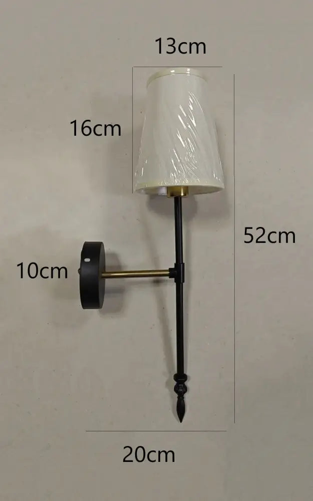 Modern brass and cream fabric led wall lamps for bedroom