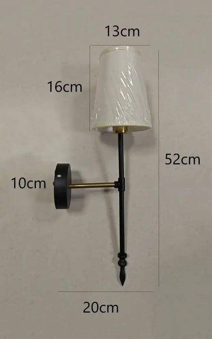 Modern brass and cream fabric led wall lamps for bedroom