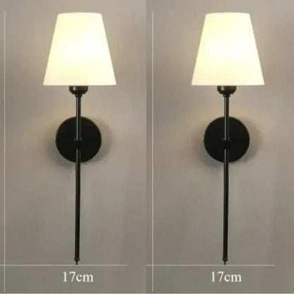 Modern brass and cream fabric led wall lamps for bedroom
