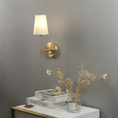 Modern brass and cream fabric led wall lamps for bedroom