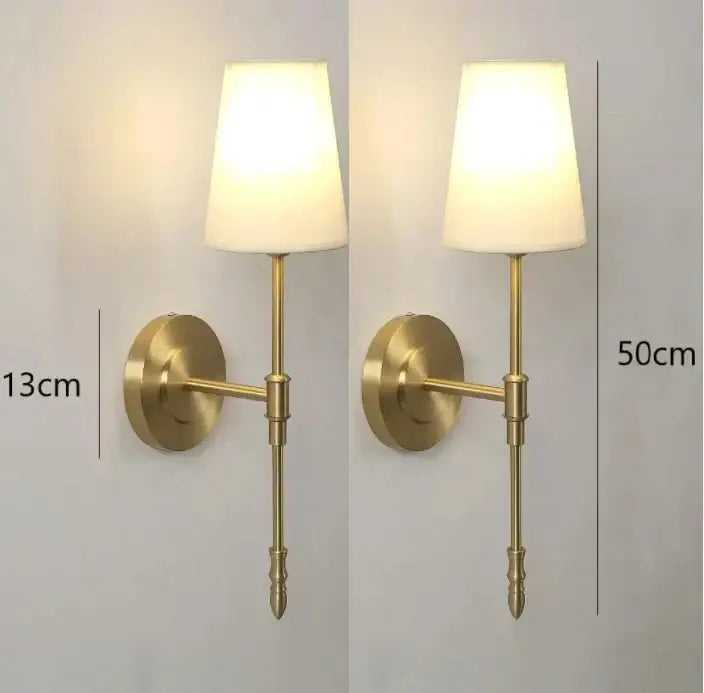 Modern brass and cream fabric led wall lamps for bedroom
