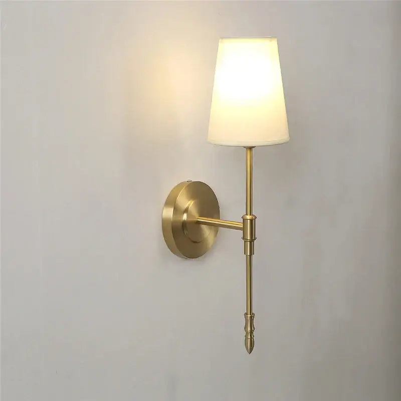 Modern brass and cream fabric led wall lamps for bedroom