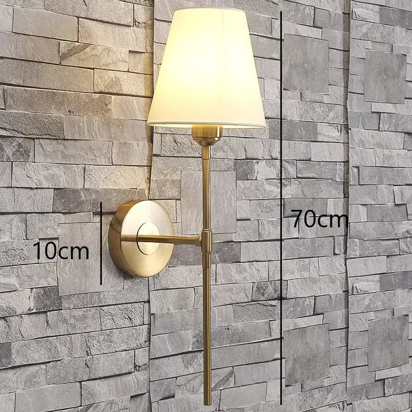 Modern brass and cream fabric led wall lamps for bedroom
