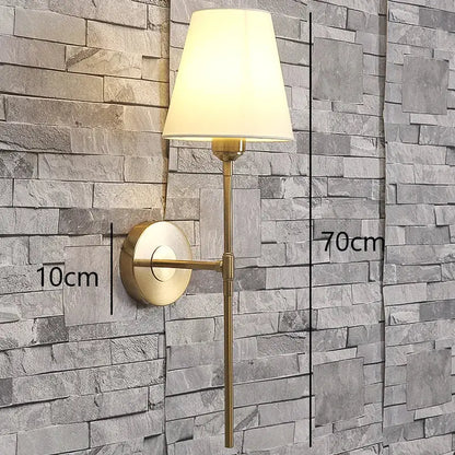 Modern brass and cream fabric led wall lamps for bedroom
