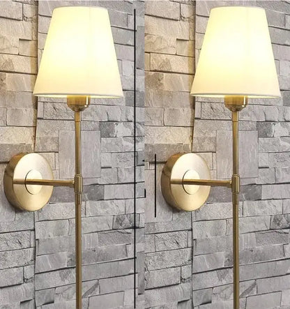 Modern brass and cream fabric led wall lamps for bedroom