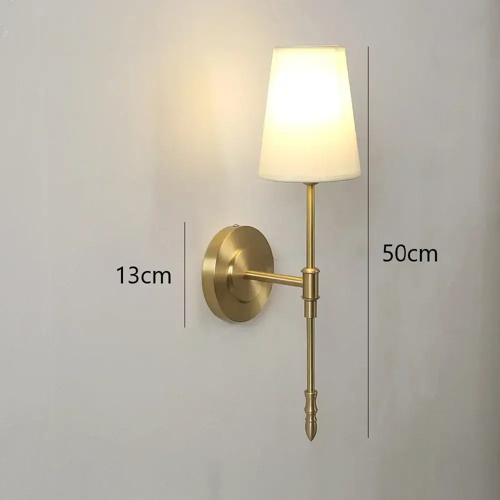 Modern brass and cream fabric led wall lamps for bedroom