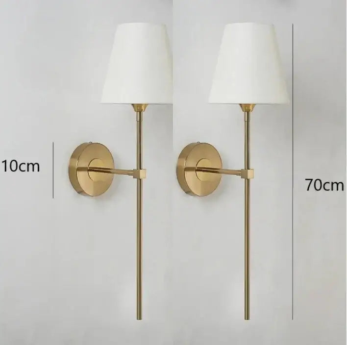 Modern brass and cream fabric led wall lamps for bedroom