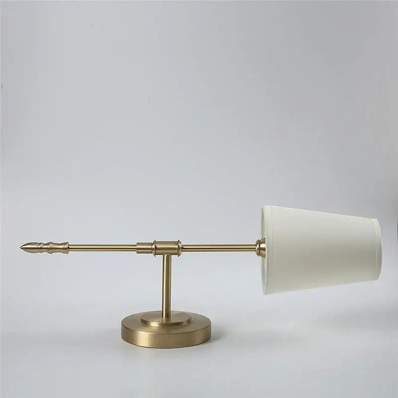 Modern brass and cream fabric led wall lamps for bedroom