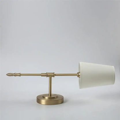 Modern brass and cream fabric led wall lamps for bedroom