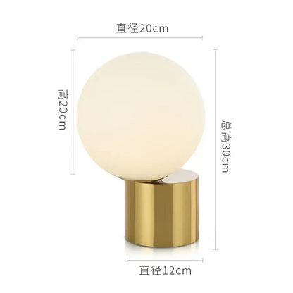 Modern brass and glass circular table lamp for bedroom
