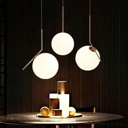 Modern brass and frosted glass ball pendant light dining room fixture