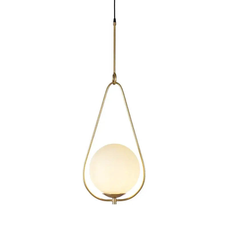 Modern brass and frosted glass ball pendant light dining room fixture