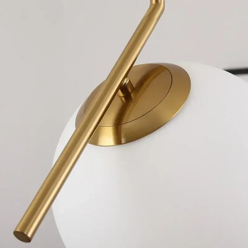 Modern brass and frosted glass ball pendant light dining room fixture