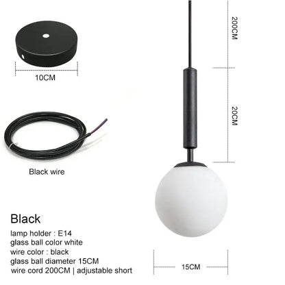 Modern brass and frosted glass ball pendant light for dining room
