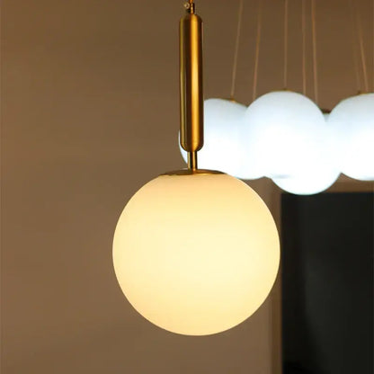 Modern brass and frosted glass pendant light dining room chandelier