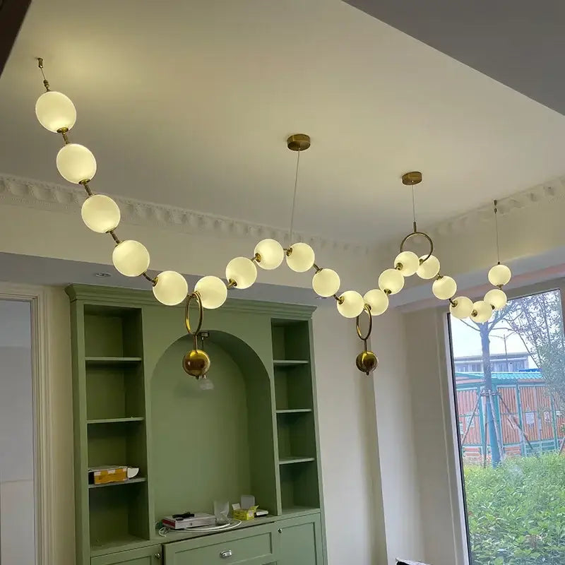 Modern brass and glass ball pendant light – dining room chandelier