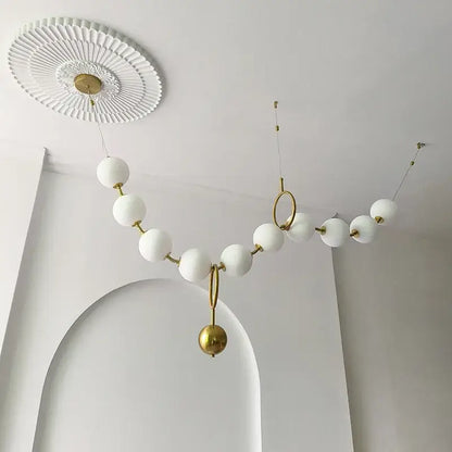 Modern brass and glass ball pendant light – dining room chandelier