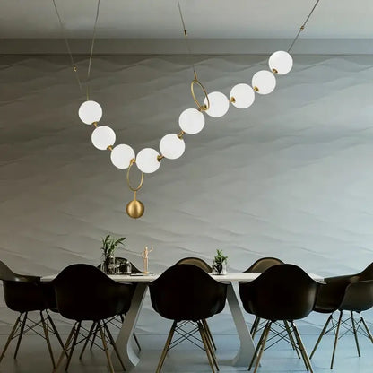 Modern brass and glass ball pendant light – dining room chandelier