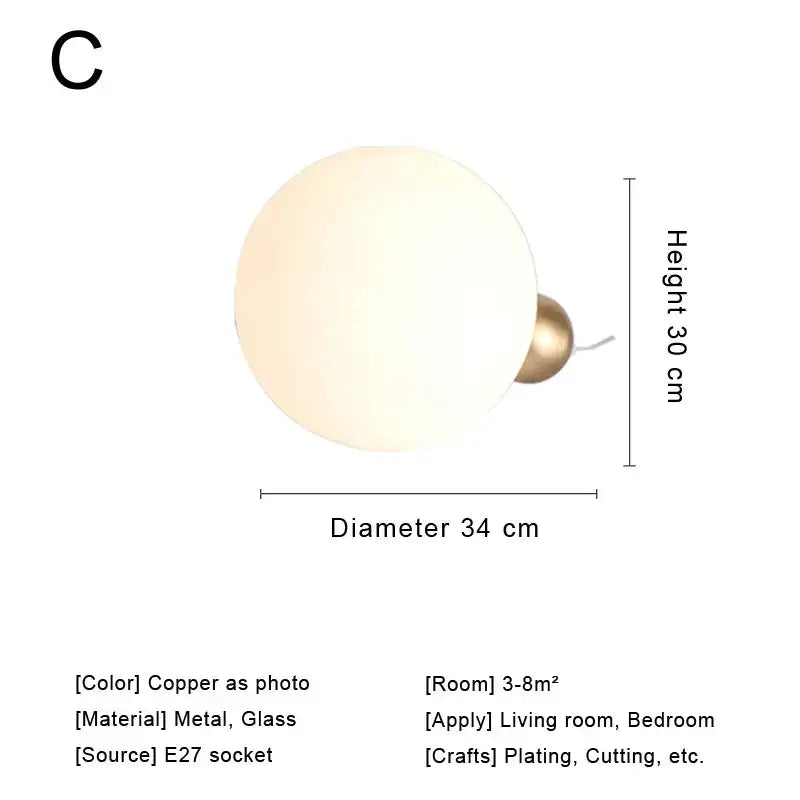Modern brass and glass desk lamp for bedroom with spherical shade