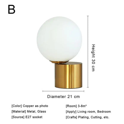 Modern brass and glass desk lamp for bedroom with spherical shade