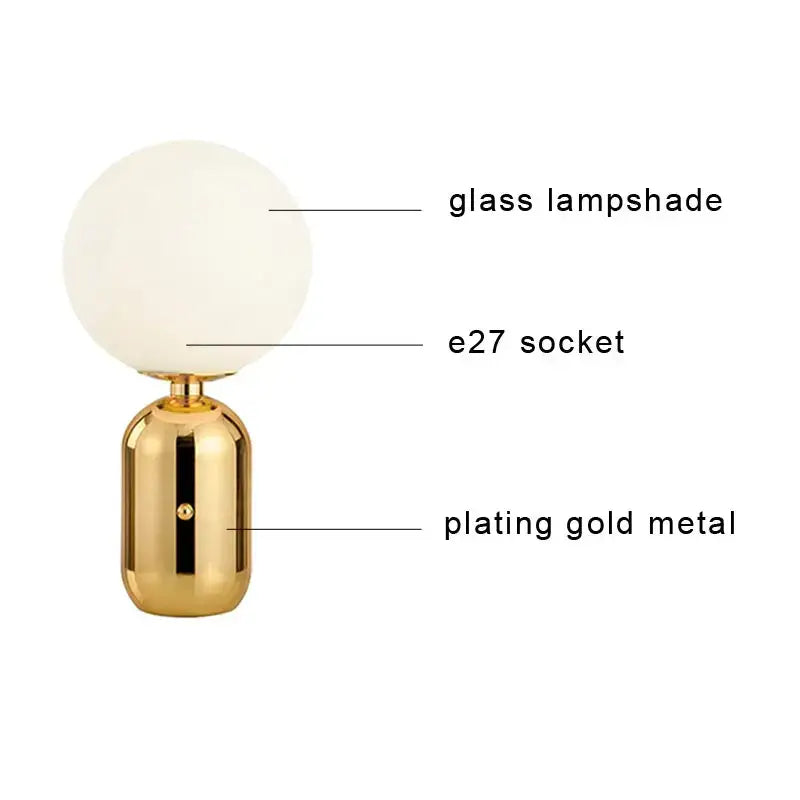 Modern brass and glass desk lamp for bedroom with spherical shade