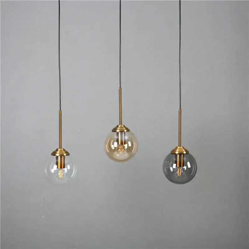 Modern brass and glass pendant lights for kitchen dining room