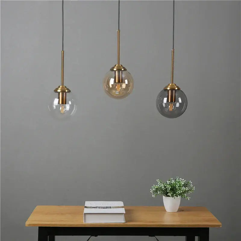 Modern brass and glass pendant lights for kitchen dining room