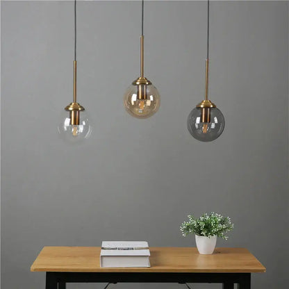 Modern brass and glass pendant lights for kitchen dining room
