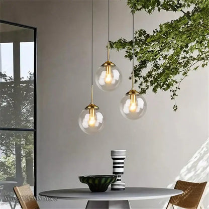 Modern brass and glass pendant lights for kitchen dining room