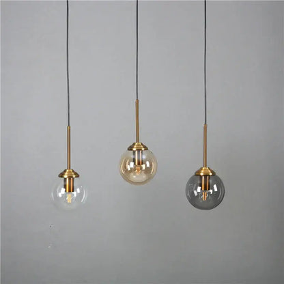 Modern brass and glass pendant lights for kitchen dining room