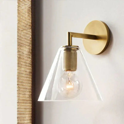 Modern brass and glass wall sconce bedroom light