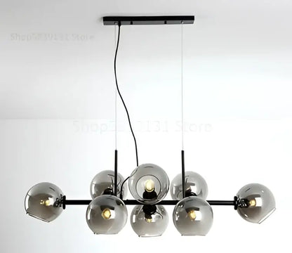 Modern brass and gray glass pendant lights for kitchen dining room