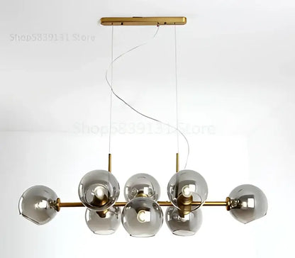 Modern brass and gray glass pendant lights for kitchen dining room